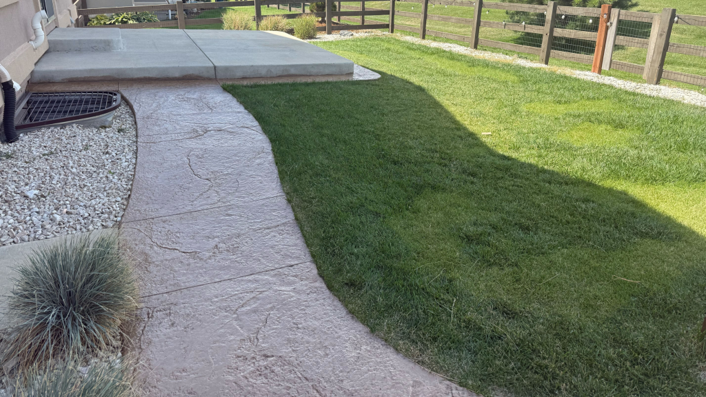 Concrete walkway compared to paver walkway at a residential and commercial property in Loveland and Fort Collins, Colorado
